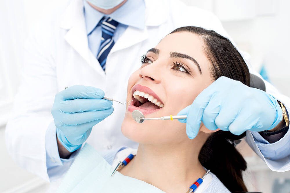 معاینه پوسیدگی دندان